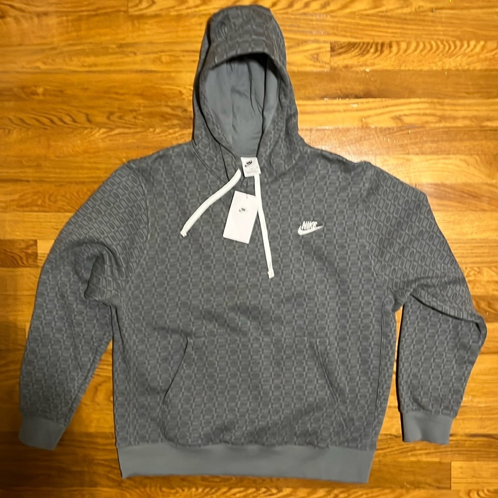 New and in great condition Nike XL Dark Gray Hoodie withh White Draw Strings